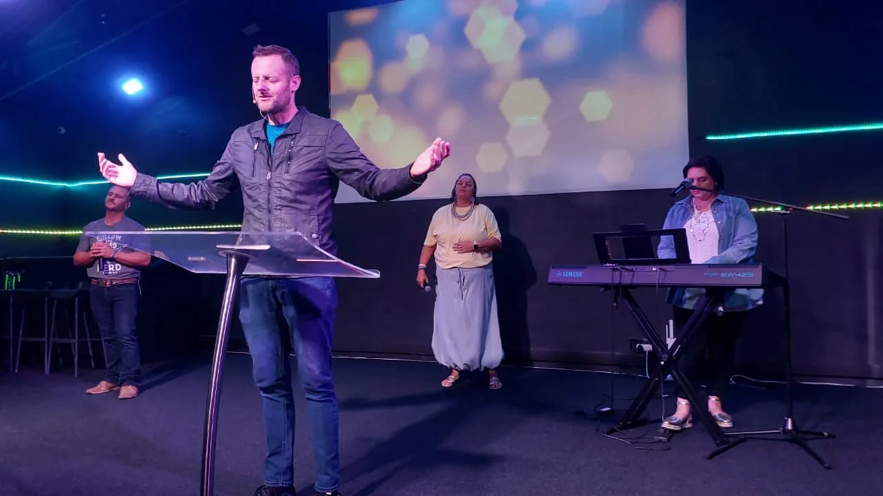 Live worship and preaching during a Sunday service at Christ Gen Kleinmond church