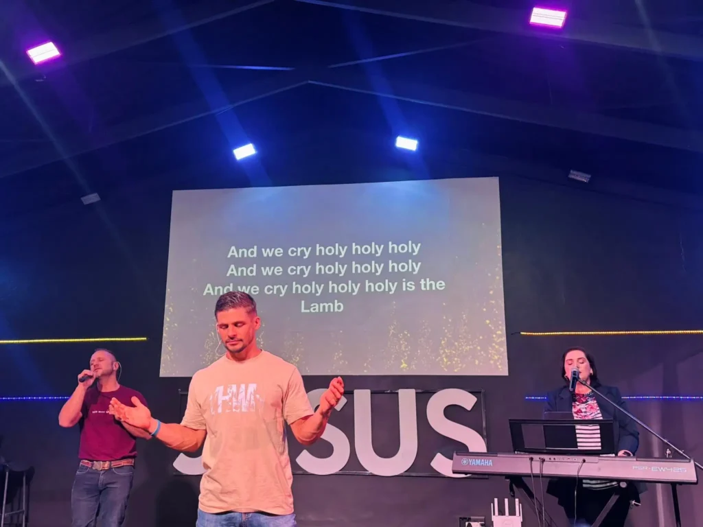 Worship team leading praise and worship during a Christ Gen Kleinmond church service