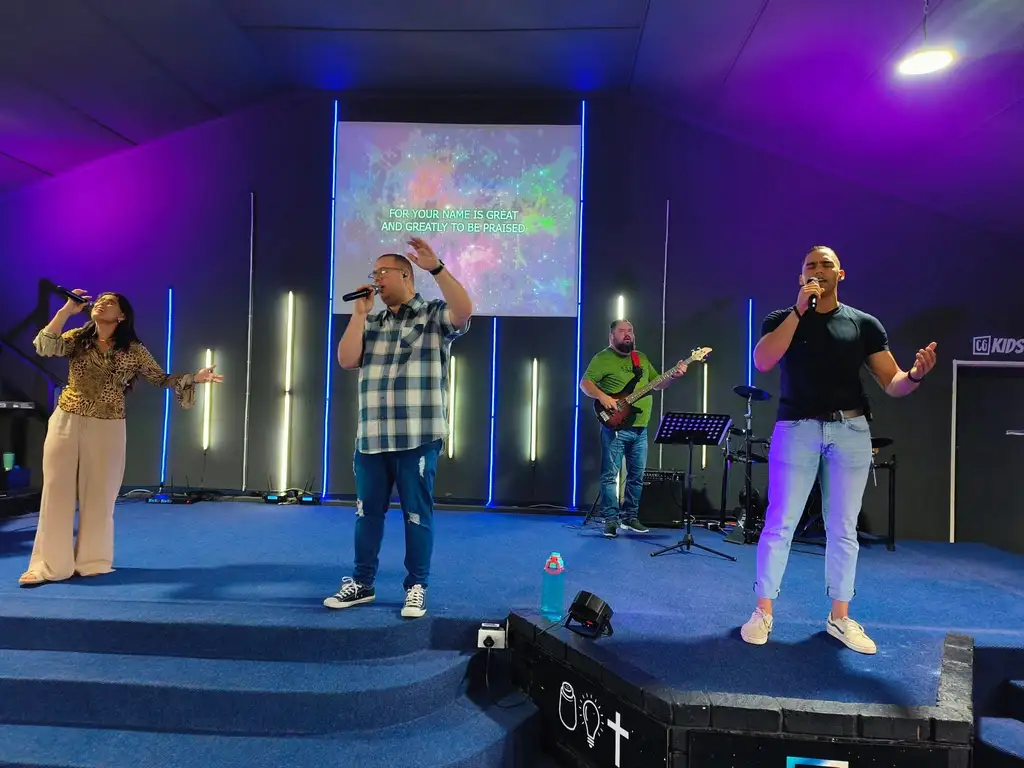Worship team leading praise and worship at Christ Gen Lakeside during a live church gathering in Lakeside