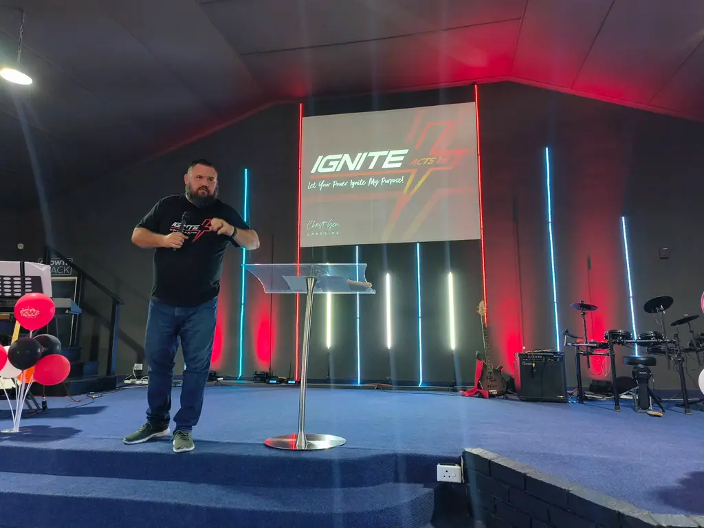 Pastor preaching during a Christ Gen Lakeside church service with biblical teaching and ministry in Lakeside